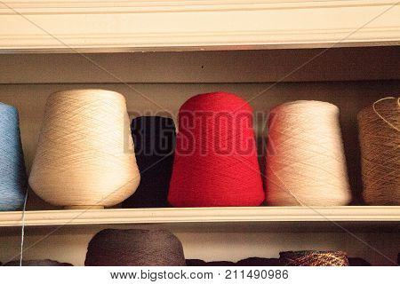 Colorful Spools Of Wool That Have Been Spun From Hand And Prepared For A Loom