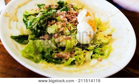 Traditional homemade cesar salad with boiled eggs