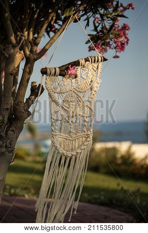 Makrame Wall Art Hanging From The Pink Oleander Tree