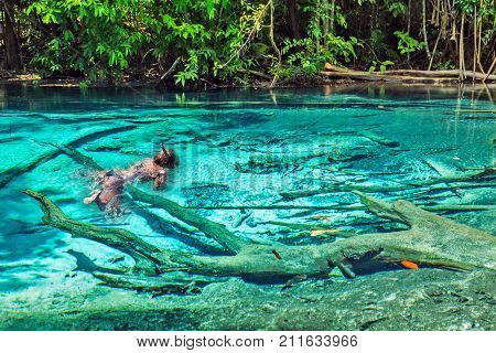 Girl Diver Snorkeling Emerald Blue Pool. Krabi, Thailand