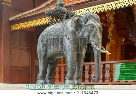 Chiang Mai January 2013 Doi su tep Temple. This temple was builted on a mountain with beautiful panoramas of the city below this is way is famous. Here a close up of an elephant sculpture inside the temple.