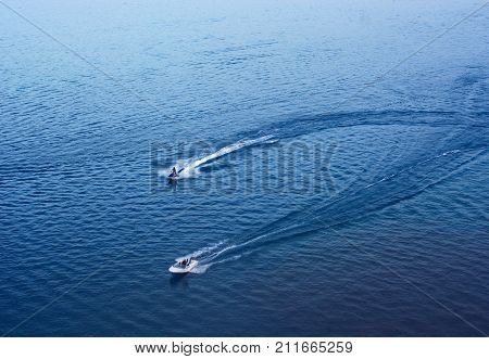 2 motor boats on the  blue lake