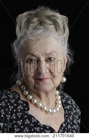 A Very Old Woman. An Eighty-year-old Woman. Studio Portrait Of An Old Woman