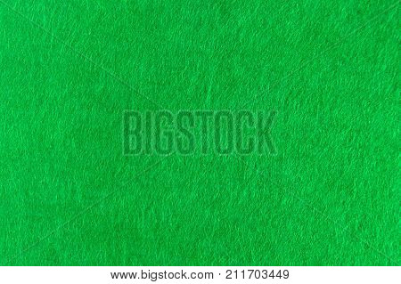 Green felt natural texture for background. Copy space.