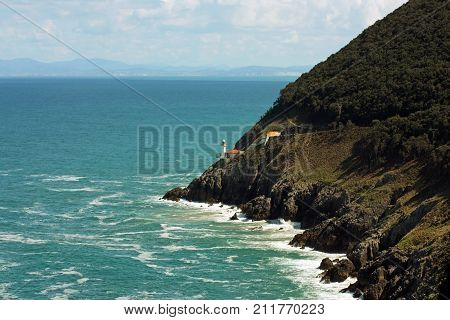 Lighthouse Fisherman on the cliff in Santona, Spain