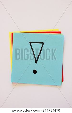 Exclamation mark on stock of colored notes