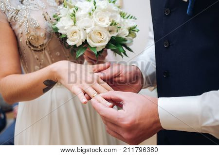 Bride And Groom With Wedding Rings