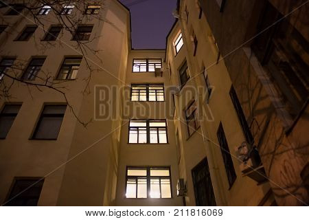 Old building in the typical yard in the Saint Petersburg (between 1924-1991 named Leningrad). St. Petersburg was founded by Tsar Peter the Great on 1703 and was the capital of imperial Russia.