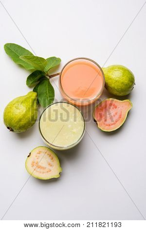 Guava  juice or Amrud drink or Smoothie with fresh Guava fruit, moody lighting selective focus