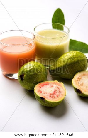 Guava  juice or Amrud drink or Smoothie with fresh Guava fruit, moody lighting selective focus