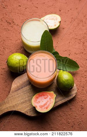 Guava  juice or Amrud drink or Smoothie with fresh Guava fruit, moody lighting selective focus