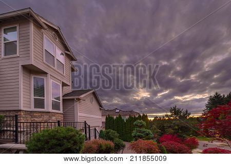 Stormy cky over North American suburbs neighborhood in fall season
