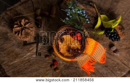 Christmas Hot Mulled Wine With Cinnamon Cardamom And Anise On Wooden Background