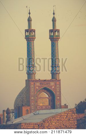 View Over The Old City Of Yazd, Iran And Masjed-i Jame' Mosque - Famous For Its Wind Towers.