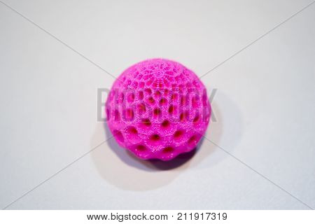 Abstract object of a blue color printed by 3d printer on white background. Fused deposition modeling, FDM. Progressive modern additive technology. Concept of 4.0 industrial revolution