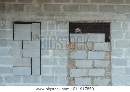 Bricked Up Door And Cinder Blocks Brick Wall Texture. Abandoned House Exterior.