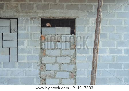 Bricked Up Door And Cinder Blocks Brick Wall Texture. Abandoned House Exterior.