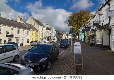 Honiton Devon England 19 October 2016: A street in Honiton. Parked cars and pavement
