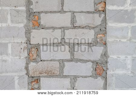 Bricked Up Door And Cinder Blocks Brick Wall Texture. Abandoned House Exterior.