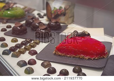 Variety of chocolate products on the counter. Food
