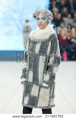 ZAGREB, CROATIA - OCTOBER 28, 2017: Fashion model wearing clothes designed by Marina Design and acessories designed by Marija Ivankovic at the 'Fashion.hr' fashion show