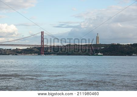The 25 de Abril Bridge (25th of April Bridge) is a suspension bridge connecting the city of Lisbon capital of Portugal to the municipality of Almada on the left (south) bank of the Tagus river