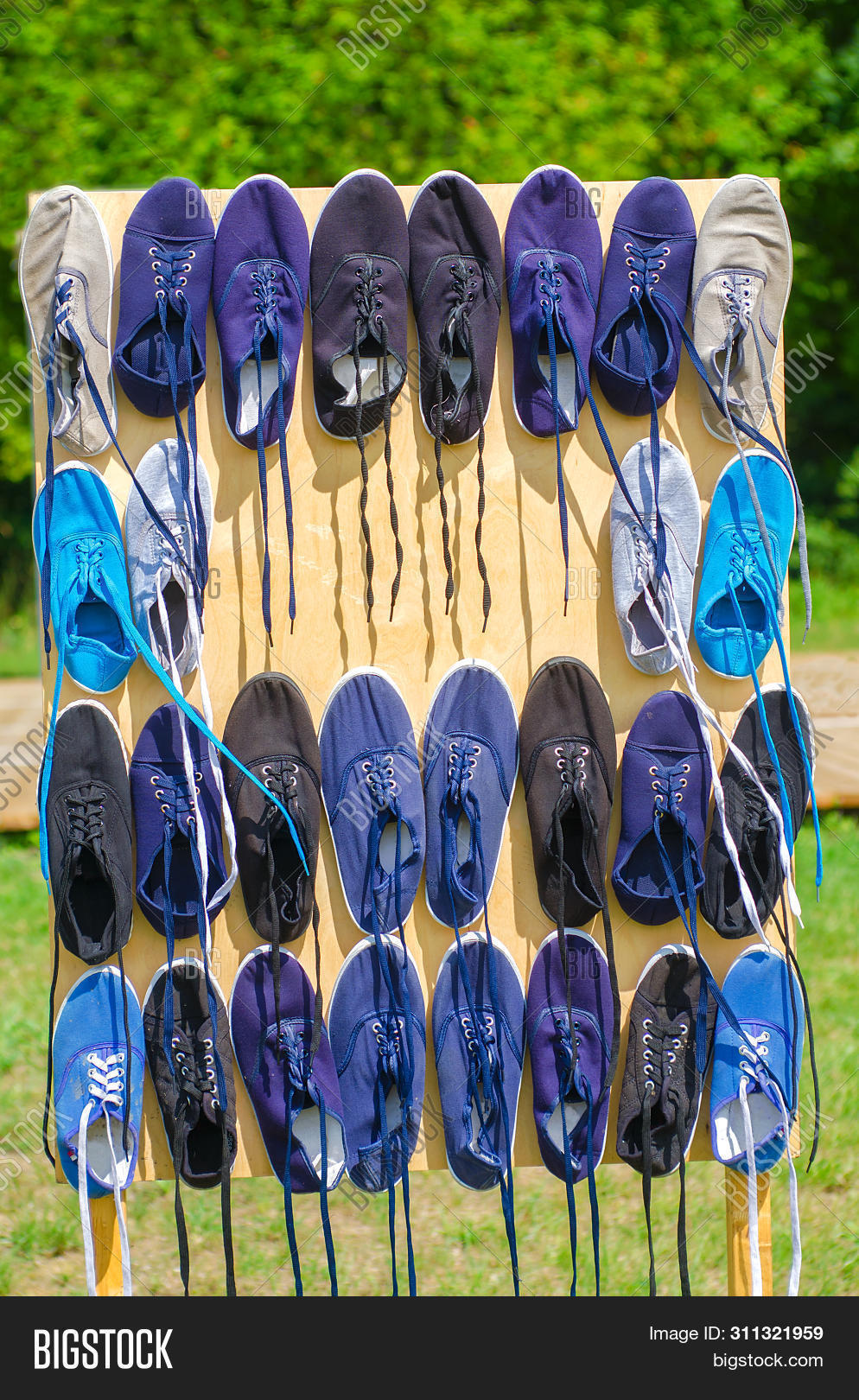 Sport Shoes Hanging On Image \u0026 Photo (Free Trial)