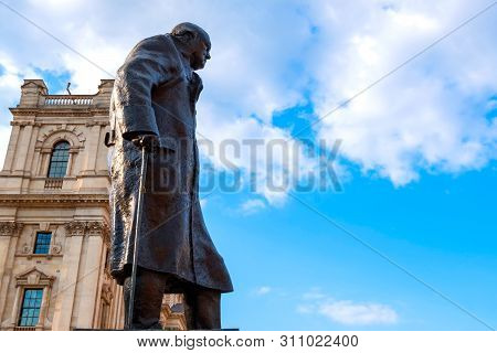 London, Uk - May 13 2018: Statue Of Winston Churchill At The Parliament Square With Other Twelve Sta