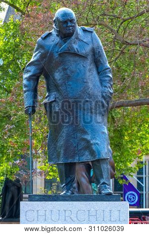 London, Uk - May 13 2018: Statue Of Winston Churchill At The Parliament Square With Other Twelve Sta