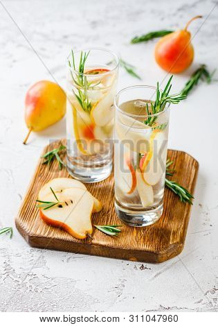Summer Drinks, Rosemary Pear Cocktails With Ice In Glasses. Refreshing Summer Homemade Alcoholic Or 