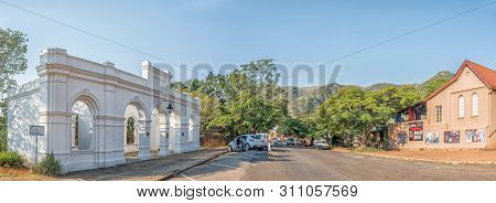 Barberton, South Africa - May 2, 2019: A Street Scene, With The Entrance To The Historic De Kaap Sto