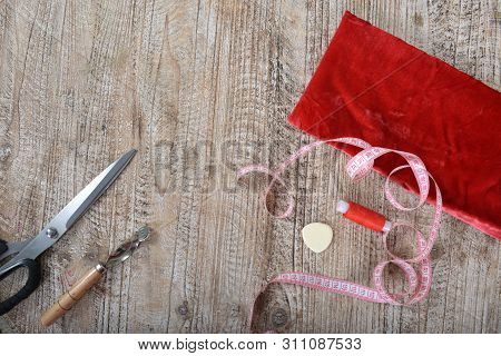 Sewing Tools And Sewing Supplies Accessories Sewing On Wooden Table.