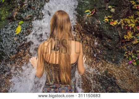 Young Woman Tourist In Holy Springs Sebatu In Bali