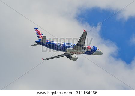 Airplane Taking-off From The Airport