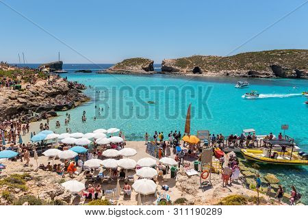 Comino, Malta - May 24, 2019 Holidays At Blue Lagoon On Island Comino, Malta