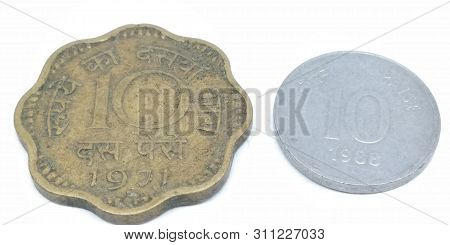 A Picture Of Ten Paise Coins Isolated On White Background