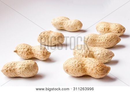 Large Peeled Peanuts Close-up Of Beans In The Shell. Unpeeled Peanuts In The Shell. Peanuts, For Bac