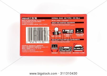 Bremen, Germany - May 29, 2019: Sealed Audio Compact Cassette Maxell Ur 90 Red. Vintage Audio Casset