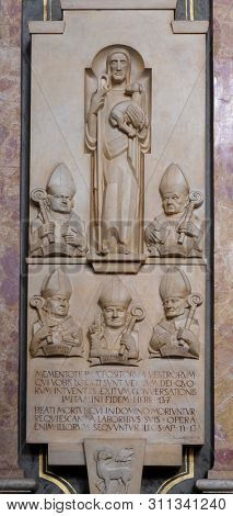 BRESSANONE, ITALY - JULY 14, 2018: A memorial tablet in the Cathedral of Santa Maria Assunta i San Cassiano in Bressanone, Italy