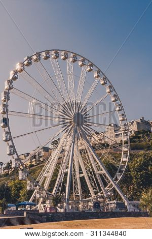 26 July 2018: Torquay, Devon, Uk - The English Riviera Wheel, A 60 Foot Ferris Wheel In Torquay Devo