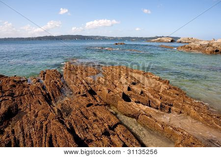 Foto della costa galiziana con la bassa marea