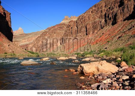 Hance Rapids With Its Colorful Rocks And Boulders In Grand Canyon National Park, Arizona.