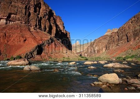 Hance Rapids With Its Colorful Rocks And Boulders In Grand Canyon National Park, Arizona.