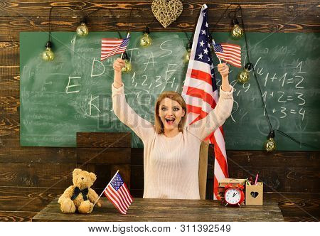 Happy Woman Holding American Flag. Independence Day Concept.