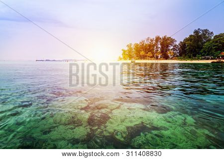 Beautiful Nature Landscape Colorful The Sunlight At The Sunrise In Summer Over The Clear Sea, See Th