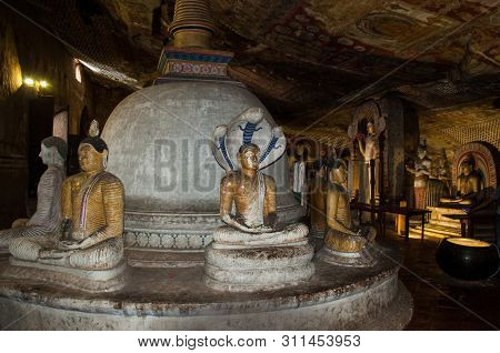 Dambulla, Sri Lanka - April 09, 2017: Statues Of Buddha In The Ancient Dambulla Cave Temple. Sri Lan
