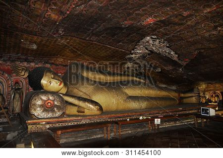 Dambulla, Sri Lanka - April 09, 2017: Statues Of Buddha In The Ancient Dambulla Cave Temple. Sri Lan