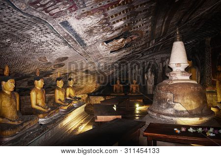 Dambulla, Sri Lanka - April 09, 2017: Statues Of Buddha In The Ancient Dambulla Cave Temple. Sri Lan