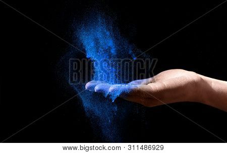 Woman Hand Holding Blue Holi Powder Over Black Background, Panorama, Copy Space