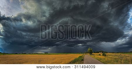 Storm Clouds With Shelf Cloud And Intense Rain
